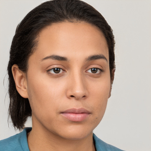 Neutral white young-adult female with short  brown hair and brown eyes