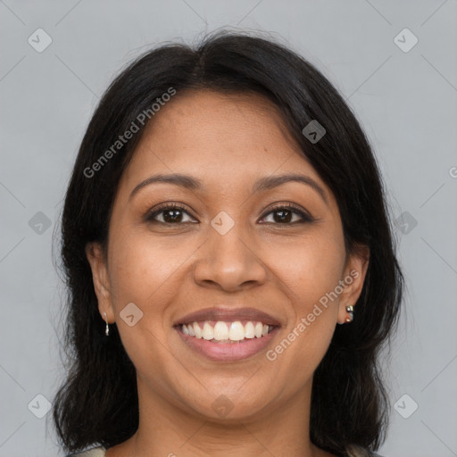 Joyful latino young-adult female with medium  brown hair and brown eyes