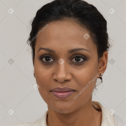 Joyful black young-adult female with short  brown hair and brown eyes