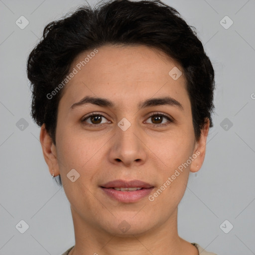 Joyful white adult female with short  brown hair and brown eyes