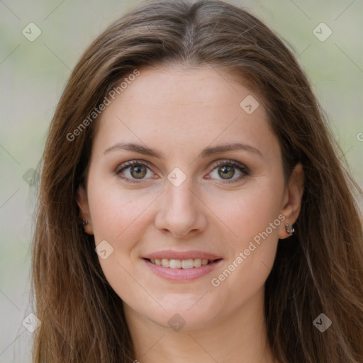 Joyful white young-adult female with long  brown hair and green eyes