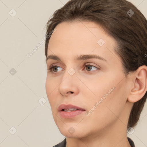 Neutral white young-adult female with medium  brown hair and brown eyes