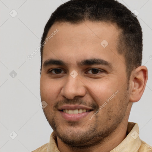 Joyful white young-adult male with short  brown hair and brown eyes