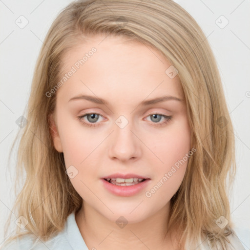 Joyful white young-adult female with medium  brown hair and blue eyes