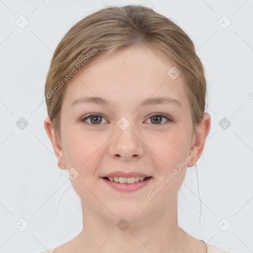 Joyful white child female with medium  brown hair and grey eyes