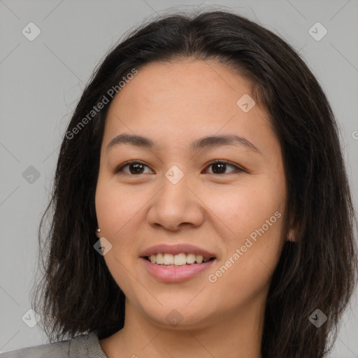 Joyful asian young-adult female with long  brown hair and brown eyes