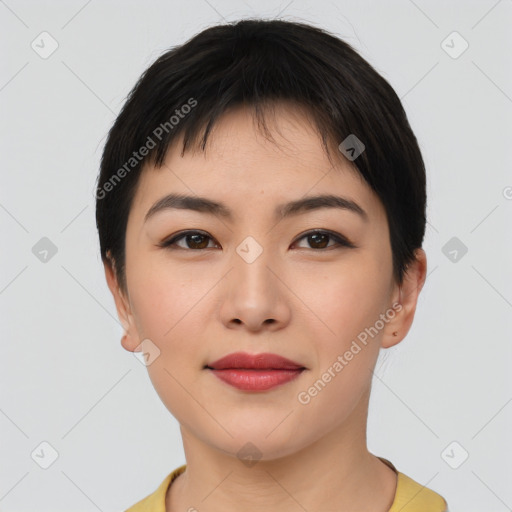 Joyful asian young-adult female with short  black hair and brown eyes