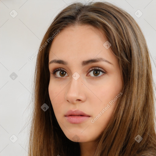 Neutral white young-adult female with long  brown hair and brown eyes