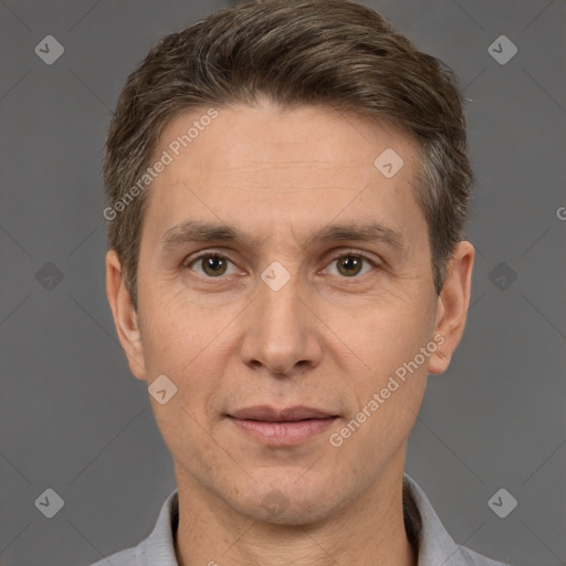 Joyful white adult male with short  brown hair and brown eyes