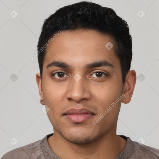 Neutral latino young-adult male with short  black hair and brown eyes