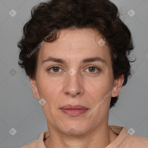 Joyful white adult female with short  brown hair and brown eyes