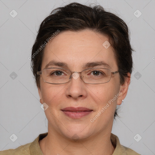 Joyful white adult female with short  brown hair and brown eyes