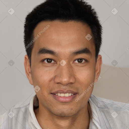 Joyful white young-adult male with short  black hair and brown eyes