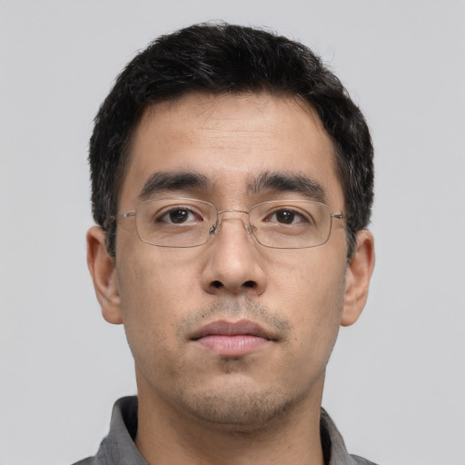 Neutral asian young-adult male with short  brown hair and brown eyes