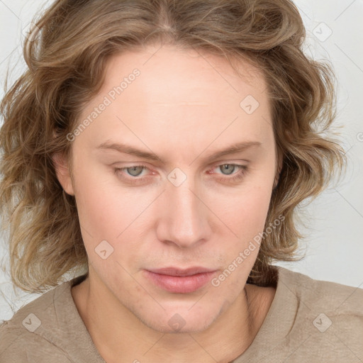 Joyful white young-adult female with long  brown hair and blue eyes