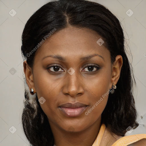Joyful black young-adult female with medium  brown hair and brown eyes