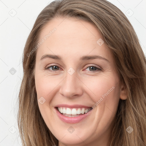 Joyful white young-adult female with long  brown hair and grey eyes