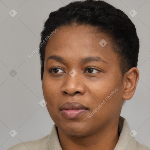 Joyful black young-adult female with short  black hair and brown eyes