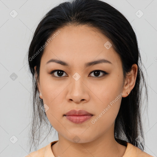 Joyful asian young-adult female with medium  black hair and brown eyes