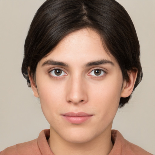 Neutral white young-adult female with medium  brown hair and brown eyes