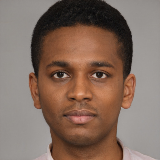 Neutral latino young-adult male with short  brown hair and brown eyes