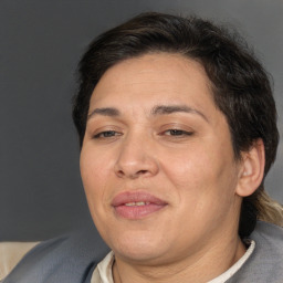 Joyful white adult female with short  brown hair and brown eyes