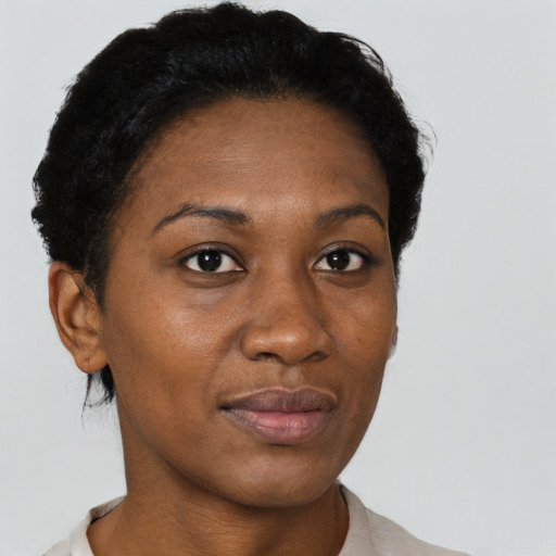 Neutral black young-adult female with short  black hair and brown eyes