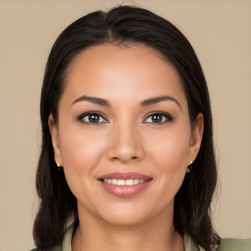 Joyful white young-adult female with long  black hair and brown eyes