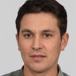 Neutral white adult male with short  brown hair and brown eyes