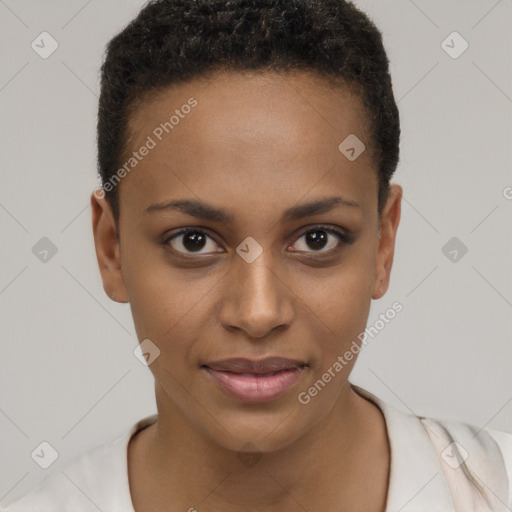 Joyful black young-adult female with short  brown hair and brown eyes