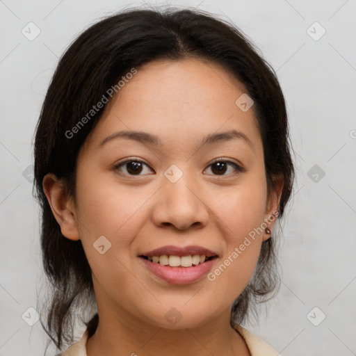 Joyful asian young-adult female with medium  brown hair and brown eyes