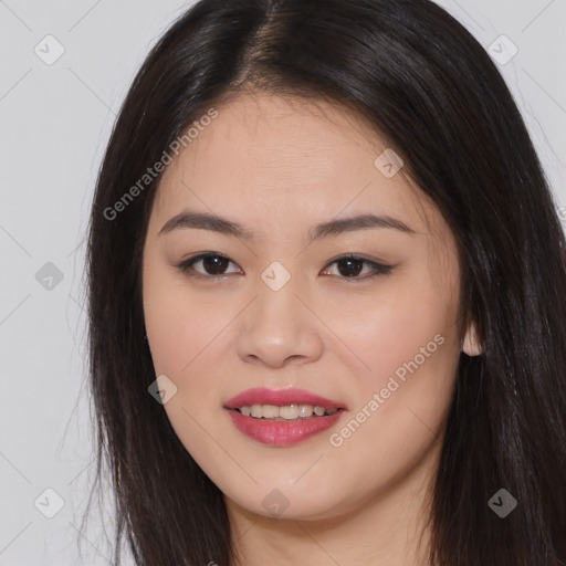 Joyful asian young-adult female with long  brown hair and brown eyes