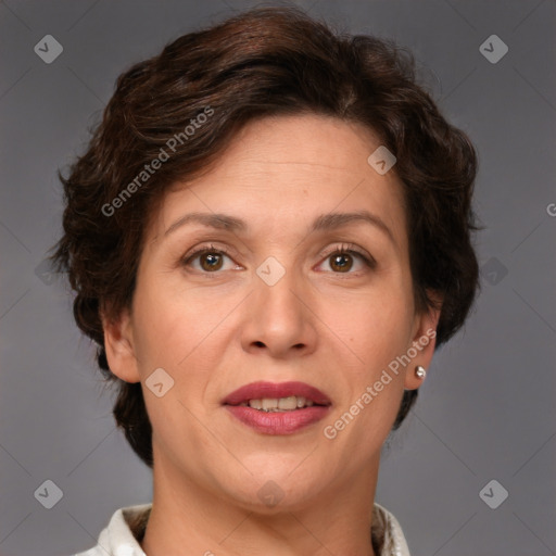 Joyful white adult female with short  brown hair and brown eyes