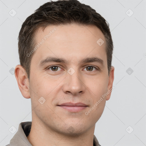 Joyful white young-adult male with short  brown hair and brown eyes