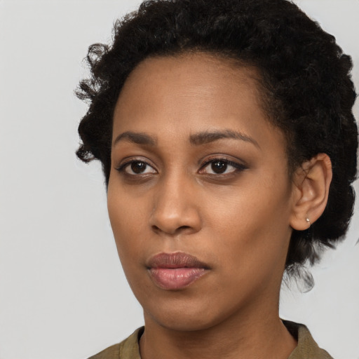 Neutral black young-adult female with short  brown hair and brown eyes