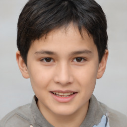 Joyful white child male with short  brown hair and brown eyes