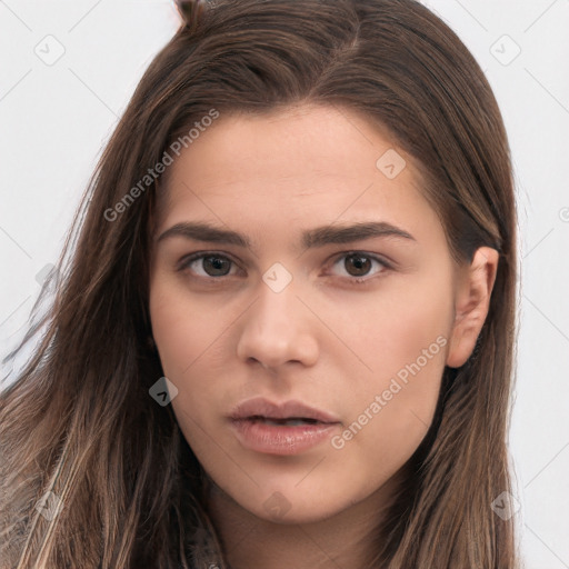 Neutral white young-adult female with long  brown hair and brown eyes