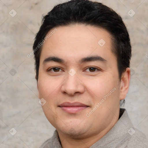 Joyful white young-adult male with short  black hair and brown eyes