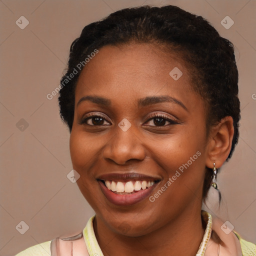 Joyful latino young-adult female with short  brown hair and brown eyes