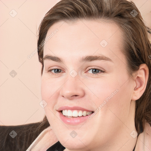 Joyful white young-adult female with medium  brown hair and grey eyes