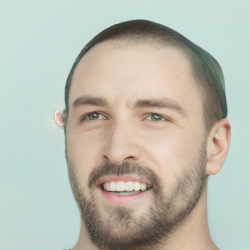 Joyful white young-adult male with short  black hair and green eyes