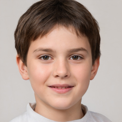 Joyful white child male with short  brown hair and brown eyes