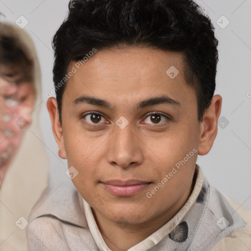 Joyful latino young-adult male with short  brown hair and brown eyes