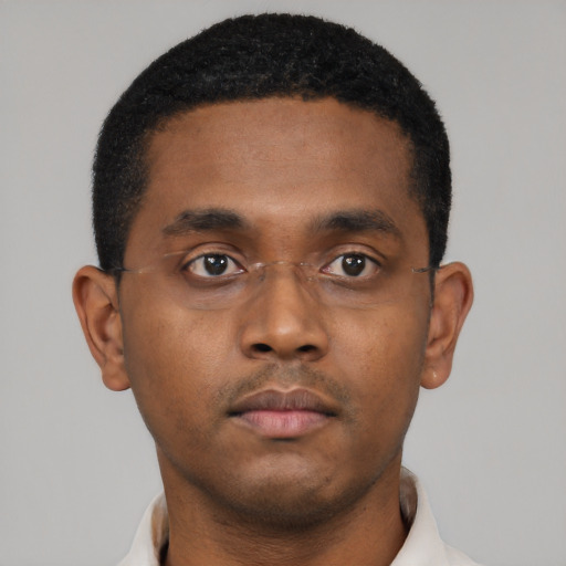 Neutral black young-adult male with short  black hair and brown eyes