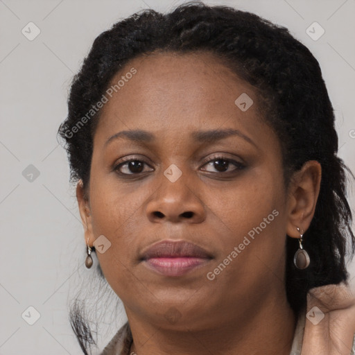 Neutral black young-adult female with short  brown hair and brown eyes