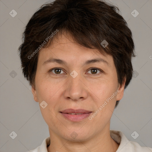 Joyful white adult female with short  brown hair and brown eyes