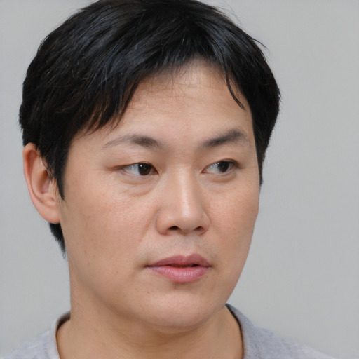 Neutral asian young-adult female with short  black hair and brown eyes