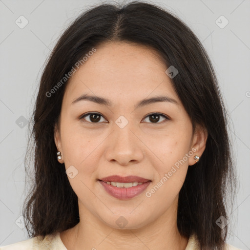 Joyful latino young-adult female with medium  brown hair and brown eyes