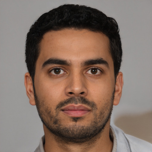 Neutral latino young-adult male with short  black hair and brown eyes