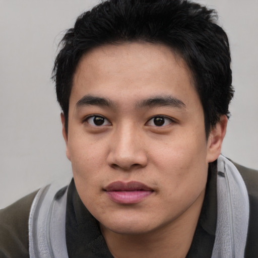 Neutral asian young-adult male with short  black hair and brown eyes